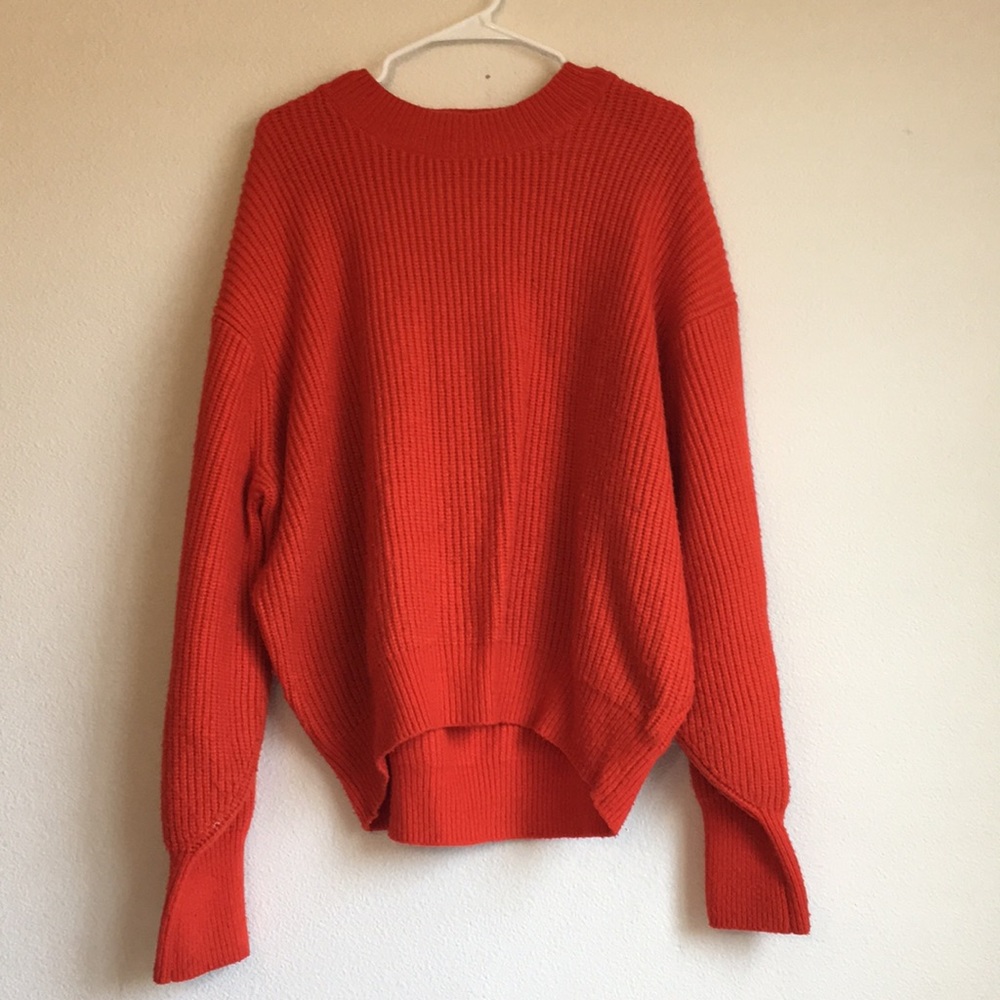 Orange knit sweater